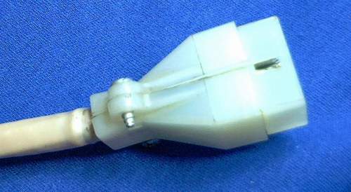 The suicidal white nylon "Molex" plug